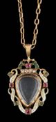 A diamond and gem-set heart-shaped pendant: with glazed compartment,