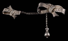 An Exeter silver cloak pin by Henry Samuel Ellis: of decorative ribbon motif design with bob and