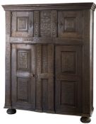An early 18th Century Dutch oak livery cupboard:,