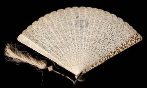 A 19th century Cantonese carved ivory brise fan: the pierced leaves decorated with figures in a