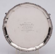 A George V silver salver, maker Adie Brothers Ltd, Birmingham, 1935: inscribed,