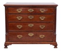 A George III mahogany gentleman's dressing chest:, the rectangular top with a moulded edge,