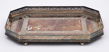A large late Victorian/ Edwardian plated galleried serving tray: of rectangular outline with canted