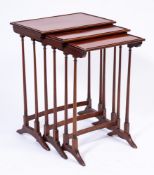 A nest of three Edwardian mahogany rectangular occasional tables:,
