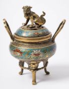 A Chinese cloisonne two-handled censer and cover: set on three legs terminating in grotesque masks,