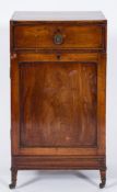A Regency mahogany and inlaid pedestal cupboard:, the crossbanded top decorated with ebonised lines,