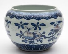 A Chinese underglaze blue and copper-red bowl: of compressed globular form,
