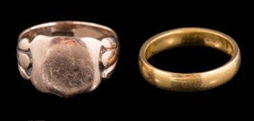 A 22ct gold band (4gms) and a 9ct gold signet ring, (4.5gms).