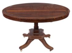 A Regency and later rosewood and brass inlaid circular breakfast table:,