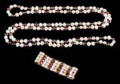 A long multi coloured freshwater cultured pearl,