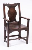 An 18th Century oak open armchair:,