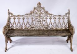 A Victorian cast iron garden bench:, pierced and decorated in the neo Gothic manner,