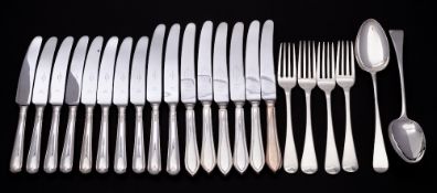 A set of four George III silver table forks, maker John Kerscher, London, 1817: crested,