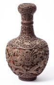A Chinese cinnabar lacquer garlic-neck 'dragon' bottle vase: decorated with dragons chasing flaming