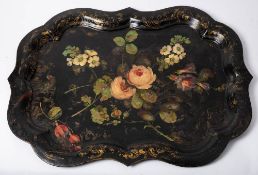 A large Victorian tole-ware tray: of cartouche-shaped outline,