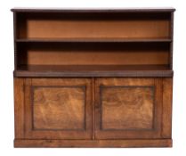 A 19th Century rosewood bookcase:, with ripple moulded decoration,