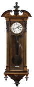 A 19th century walnut 'Vienna' regulator wall clock: the eight-day duration,