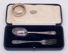 An Edward VII silver christening fork and spoon, maker Josiah Williams & Co, London, 1905: cased,