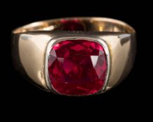 A synthetic ruby single-stone ring: the cushion-shaped synthetic ruby approximately 8.