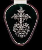 A gold backed silver and diamond mounted Portuguese-type cross motif pendant/brooch: total diamond