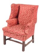 A late 19th Century mahogany wing frame armchair in the Georgian taste:,