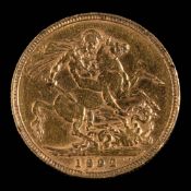 A Victorian sovereign dated 1892.