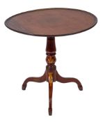 An early 19th Century mahogany and gilt decorated circular tea table:,