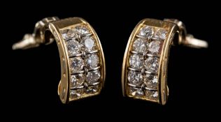 A pair of 18ct gold diamond hoop style ear-clips: set with round brilliant-cut diamonds estimated