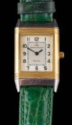 Jaeger LeCoultre. A lady's Jaeger LeCoultre Reverso, bi-metal wristwatch: numbered 260.5.