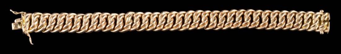 A curb-link bracelet stamped '585': approximately 19cm long, 25gms gross weight.