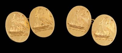 A pair of 18ct gold oval panel, crested cuff-links: Birmingham hallmarks to reverse,
