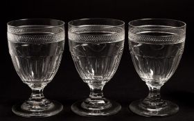 A set of six Georgian-style cut glass rummers: with hobnail bands and slice cut lower bowls, 13.