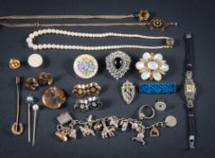 An early 20th century gold, aquamarine and seed-pearl pendant on gold chain,