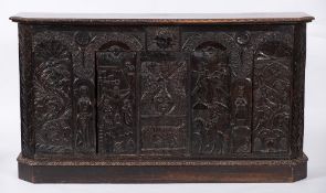 An unusual oak side cupboard incorporating 17th Century carved timbers:,