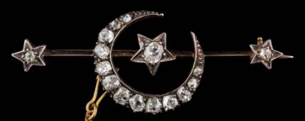 A diamond mounted crescent bar brooch: with graduated, old-cut diamonds approximately 1.