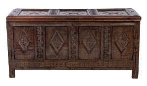 An 18th Century carved oak rectangular coffer:,
