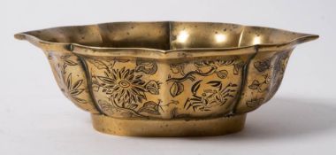 A Chinese polished bronze quatrefoil bowl: of lotus form, the exterior engraved with a crab, birds,