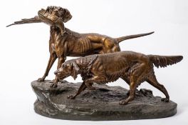 After Clovis-Edmond Masson (1838-1913) a bronzed spelter group of two hunting dogs retrieving a