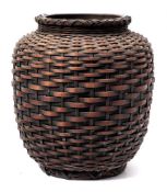 A Japanese Ikebana woven wickerwork ovoid vase: with metal liner, 28cm.