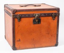 A Louis Vuitton canvas and leather bound travelling cabin trunk: of square outline,