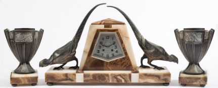 An Art Deco marble clock with pheasants: the eight-day duration movement striking the hours on a