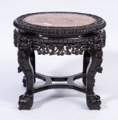 A Chinese carved hardwood circular urn stand:,