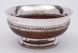 An Omar Ramsden walnut and silver mounted mazer bowl, stamped marks OR London, 1929,