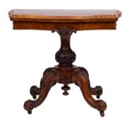 A Victorian carved walnut card table:,