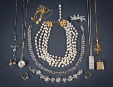 A peridot and seed pearl lavalier,: a moonstone necklace, two gold and diamond rings,