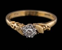 An 18ct gold and illusion-set diamond single-stone ring: the round,