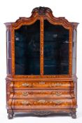 An early 19th Century Dutch mahogany and floral marquetry bombe fronted display cabinet:,