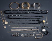Jewellery items to include faceted jet bead necklaces,: gold plated and silver bangles,