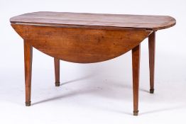 A 19th Century fruitwood oval drop flap dining table:, the hinged top on square tapered legs,