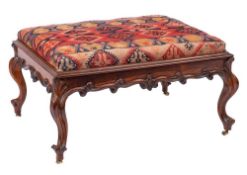 A Victorian carved rosewood rectangular stool:, with an upholstered Turkoman flatweave slip in seat,
